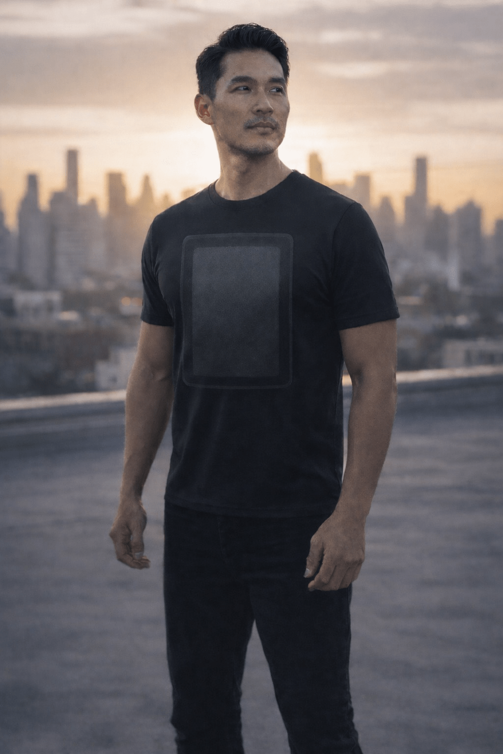 Man wearing discreet concealable body armor shirt in an urban city setting representing invisible everyday protection