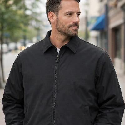 Man wearing lightweight concealable bulletproof jacket NIJ Level IIIA discreet body armor everyday urban wear